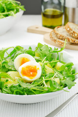 Salad with rocket salad, potatoes and eggs