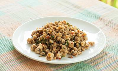 Thai spicy food , fried fish with sweet basil