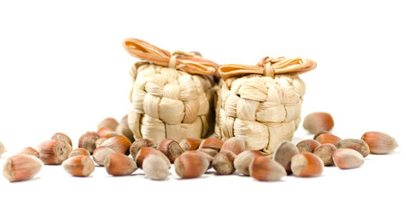 Strawy sandals with  handful of hazelnuts around