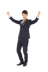 confident businessman standing and thumb up
