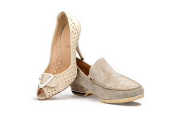 Beige female shoe and beige men's shoe