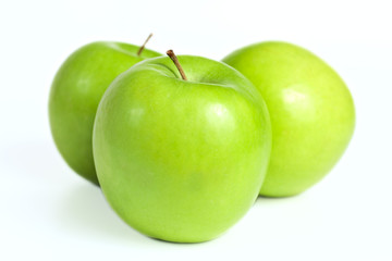 ripe fresh green apples on white background
