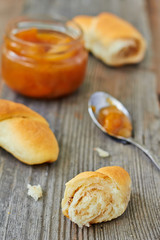 Slice croissant and apricot jam