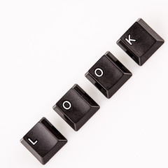 look word written with black computer buttons over white
