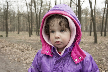 Little girl in the rain forest.