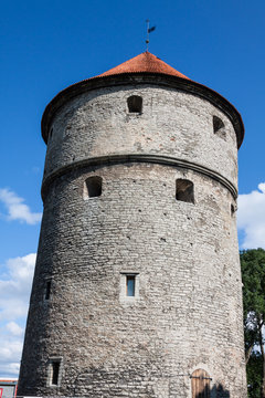 View of fortress towers and church on sky background. Tallinn. E