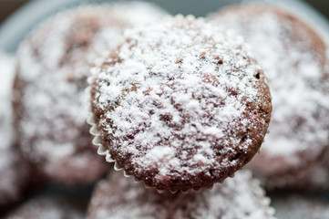 tasty muffin cakes sprinkled with powdered sugar homemade