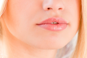 plump lips beautiful blonde on a white background
