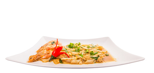 A plate of char kway teow with prawns and gravy