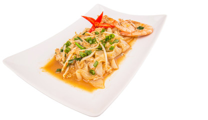 A plate of char kway teow with prawns and gravy