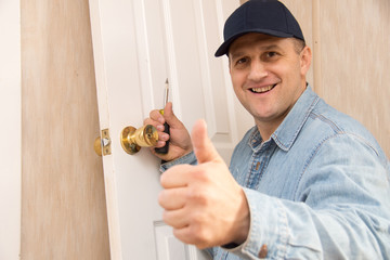 Locksmith installs lock