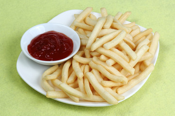 Potatoes fries with ketchup