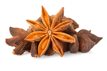 Anise stars on a white background