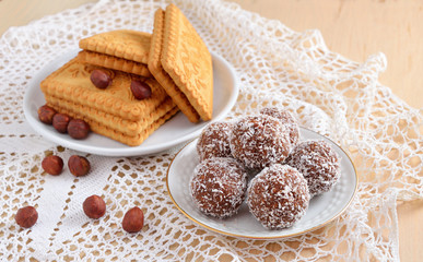 Homemade sweets with crumbs of cookies, coconut and nuts