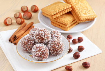 Homemade sweets with crumbs of cookies, coconut and nuts