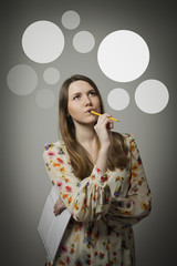 Thinking. Girl and gray bubbles.