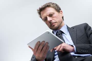 Businessman working with tablet