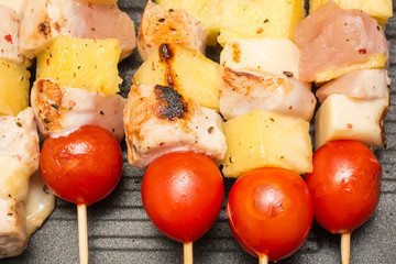 Exotic Skewers With Chicken, Tomatoes, Pineapple And Mozzarella