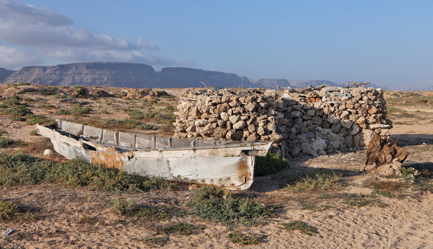 Traditional fishing boat huri on beach of Socotra Island 