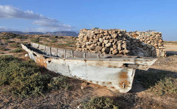 Traditional fishing boat huri on beach of Socotra Island 