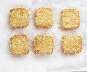 Cookies with almonds on white crumpled paper