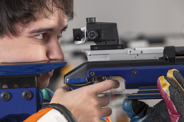 Close-up Of Man Shooting Target - 63921227