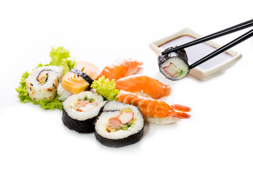 Sushi assortment on white background.