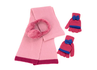 Pink wool scarf,a pair of gloves and earmuffs.Winter accessories