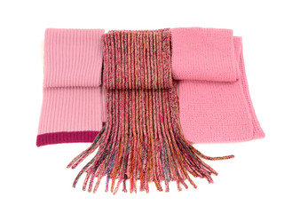 Three cute pink winter scarves. Wool scarves isolated on white.