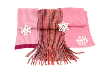 Three cute pink winter scarves with snowflakes. Isolated 