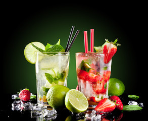 Mojito drinks on black background