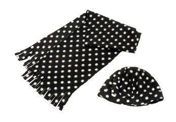 Black with white dots scarf and hat. Winter accessories isolated