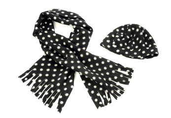 Black with white dots scarf and hat. Winter accessories isolated