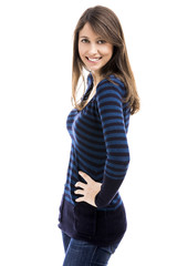 Beautiful and happy woman smiling over a white background