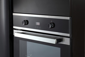 Electric oven built into kitchen furniture