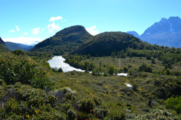 Fototapeta na wymiar Green hills around Rio Pingo, Torres del Paine