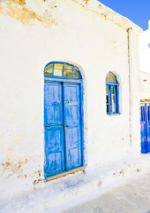 blue colored wooden door in Amorgos island in Greece