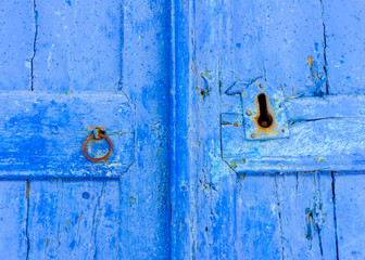 Detail of a blue wooden door in Amorgos island in Greece