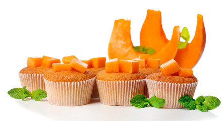 Tasty pumpkin muffins, isolated on white
