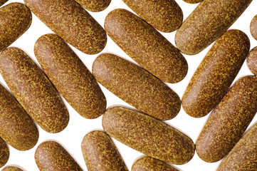 Herbal vitamin pills, isolated on white