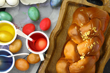 Easter sweet brioche, colored eggs and liquid dye