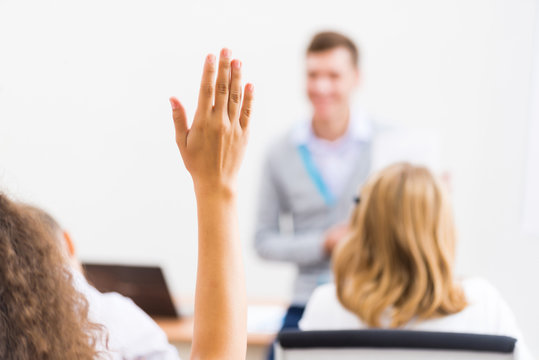 Female Hand Raised In Class