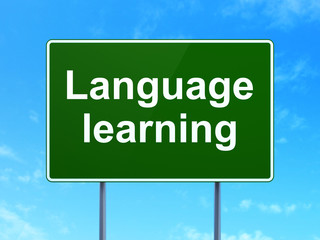 Education concept: Language Learning on road sign background