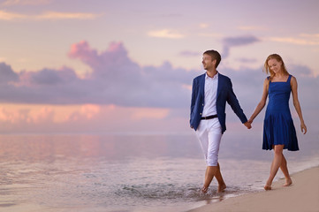 Beautiful romantic couple on a tropical beach