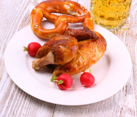 Oktoberfest chicken with pretzel, beer, radish