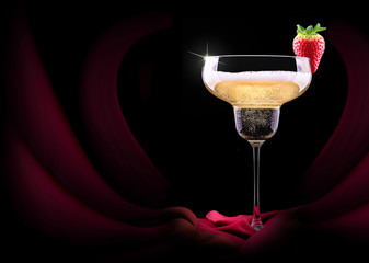 champagne glass and red silk
