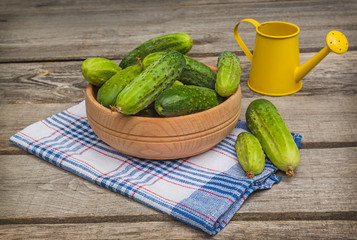 Cucumbers in a wooden bowl