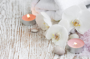 Fototapeta na wymiar Spa set with white orchids