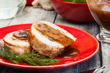 Sliced pork lion roll stuffed with mushrooms