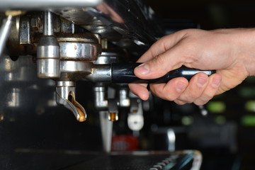 Fototapeta na wymiar Espresso machine brewing a coffee